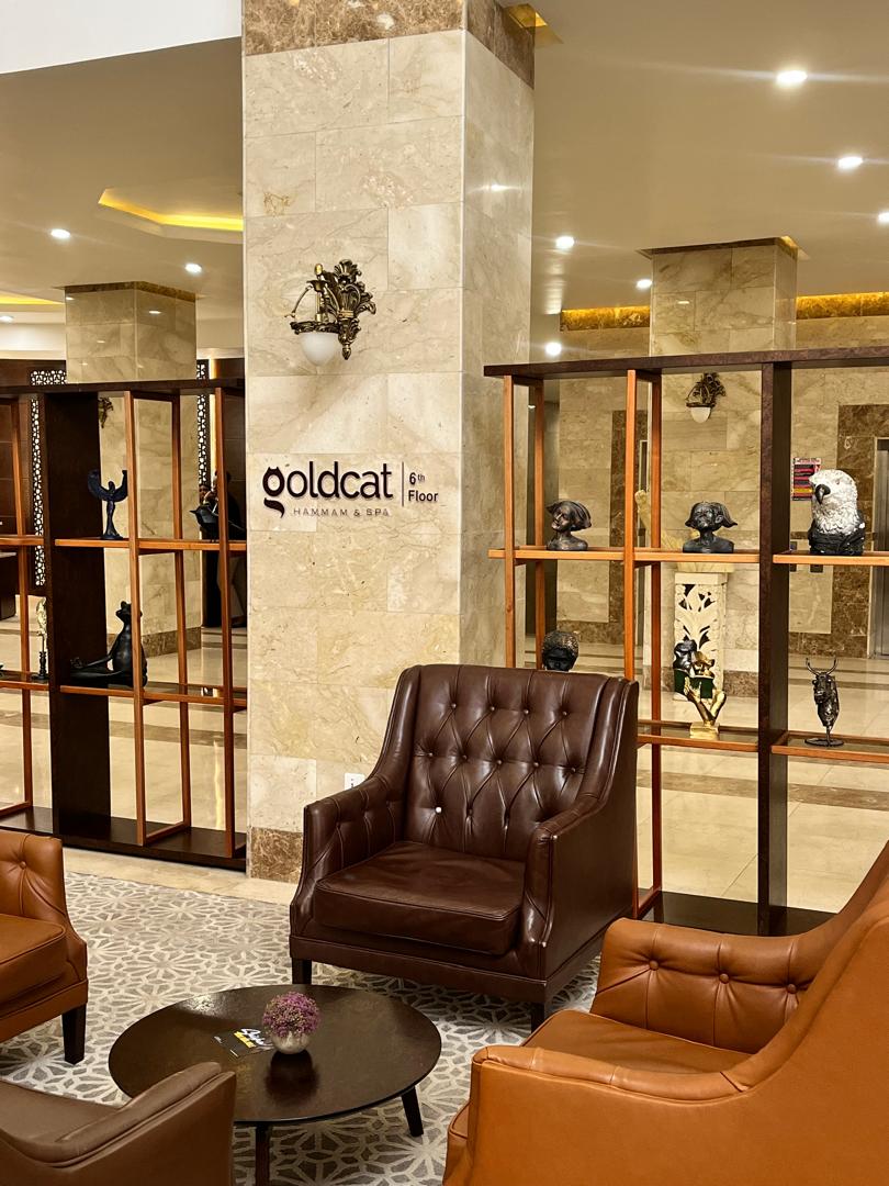 GoldCat Hammam & Spa lobby on the sixth floor of Johnwood Hotel by Bolton, with the goldcat marble pillar sign visible